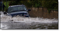 Car on flooded road